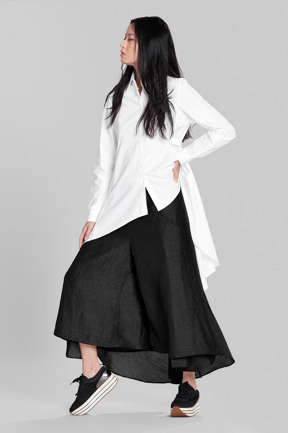 ASYMMETRICAL FLARE SHIRT