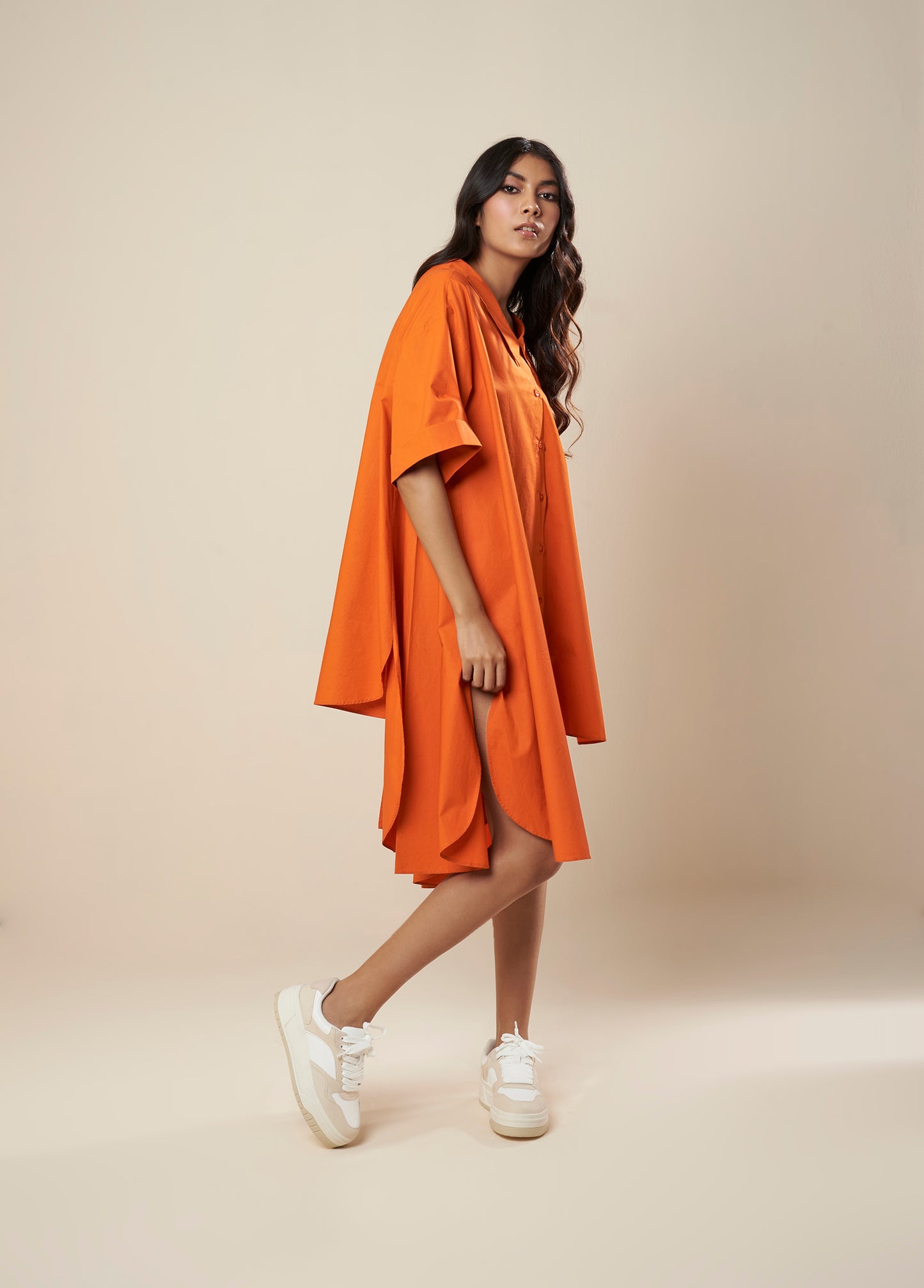 FLARE SHIRT WITH ASYMMETRICAL HEM PANELS