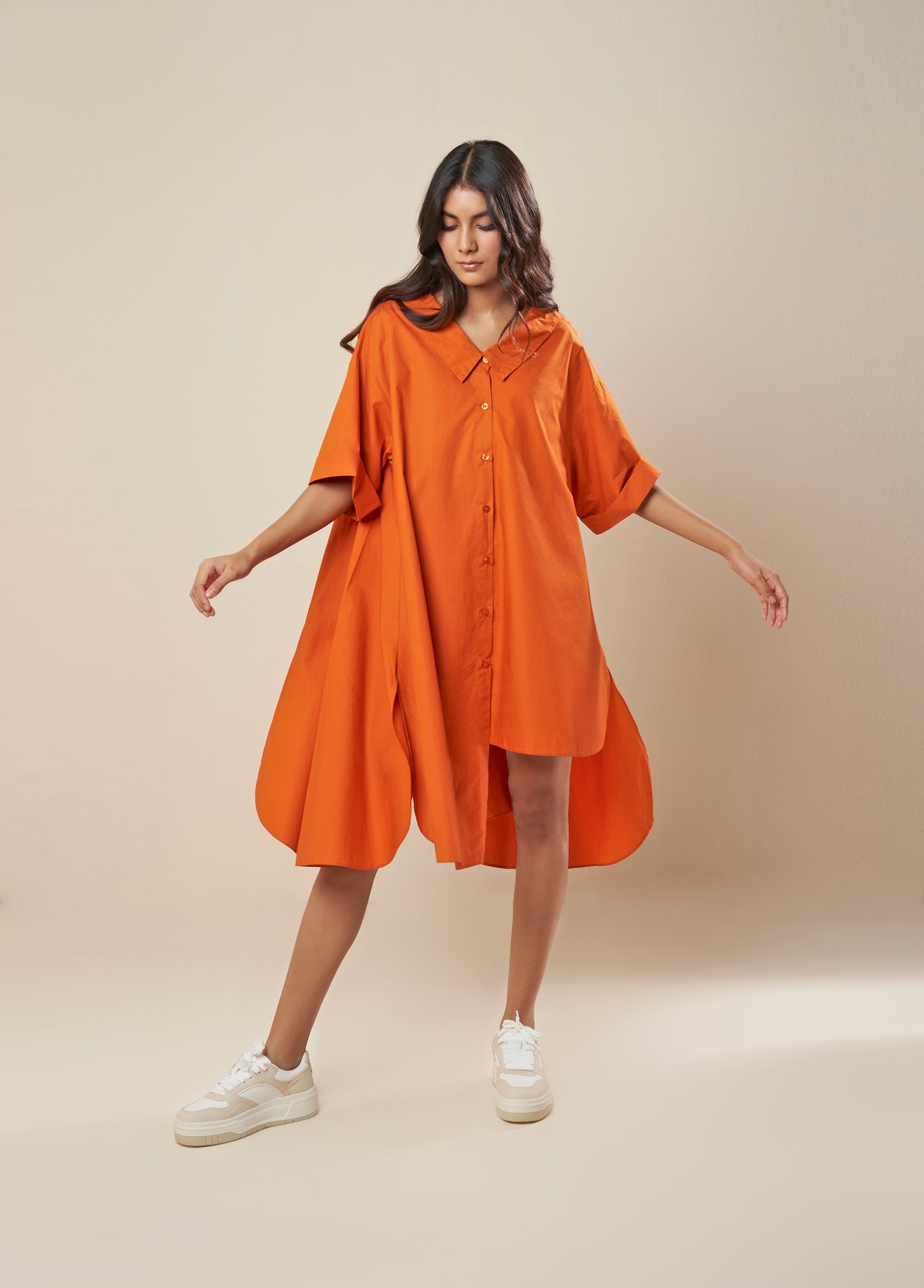 FLARE SHIRT WITH ASYMMETRICAL HEM PANELS