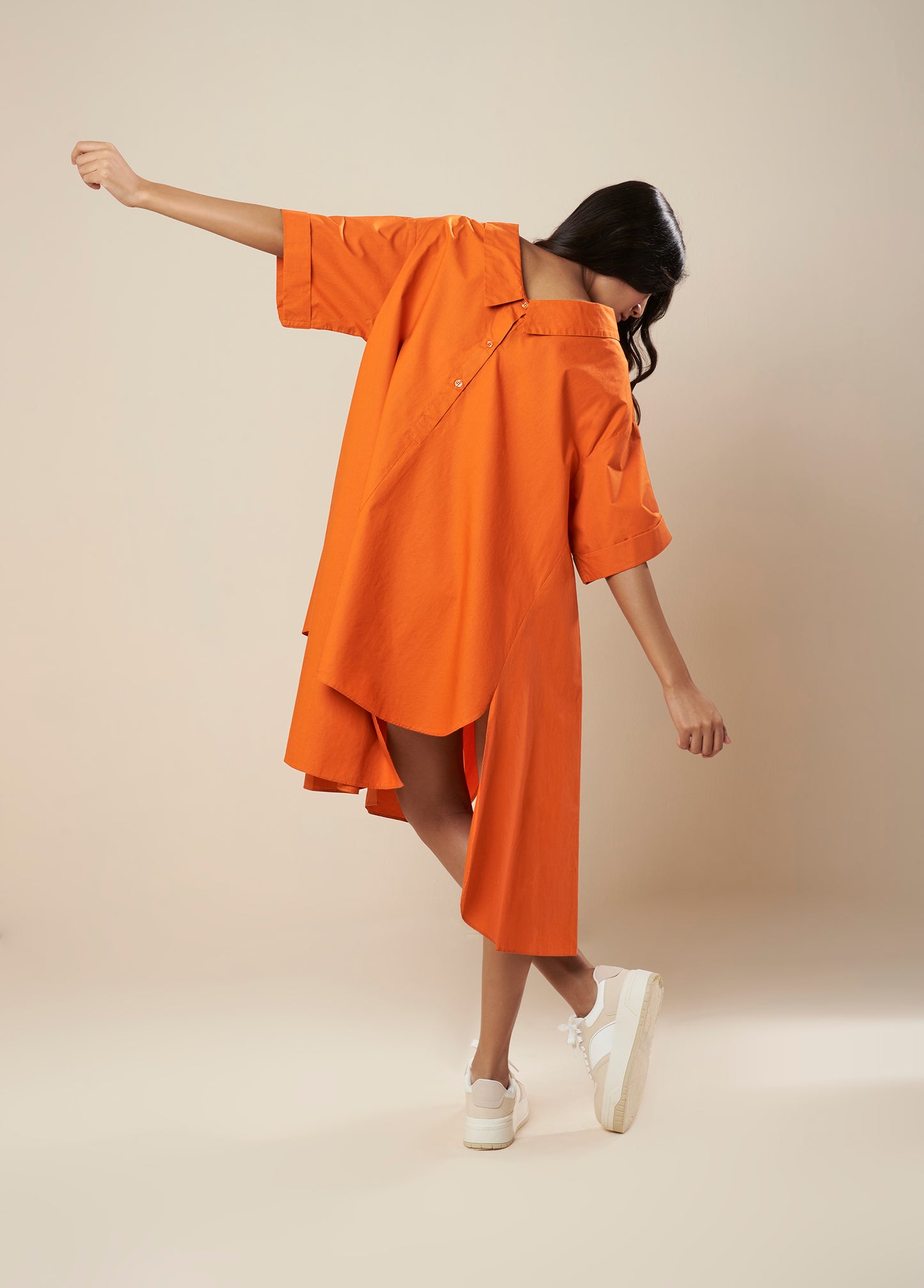 FLARE SHIRT WITH ASYMMETRICAL HEM PANELS