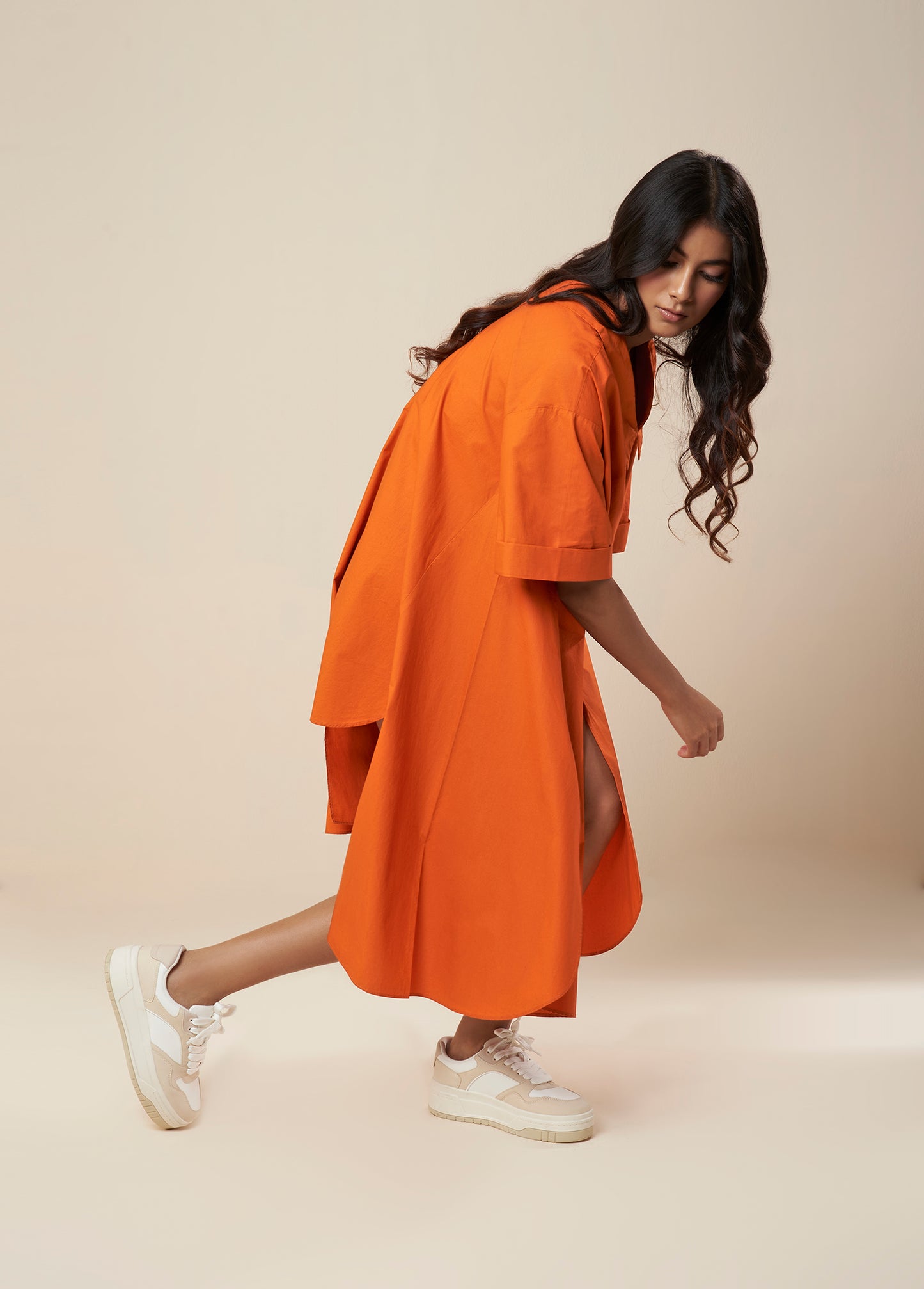 FLARE SHIRT WITH ASYMMETRICAL HEM PANELS