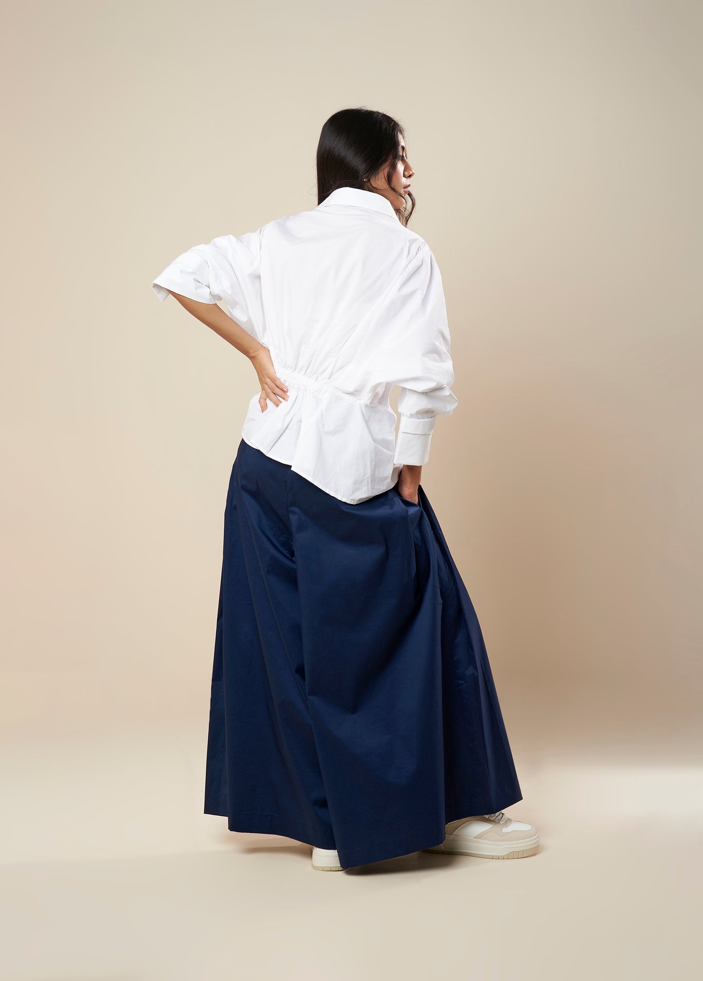 TOP V NECK WITH FRONT PLEAT PANEL AND ELASTIC BACK