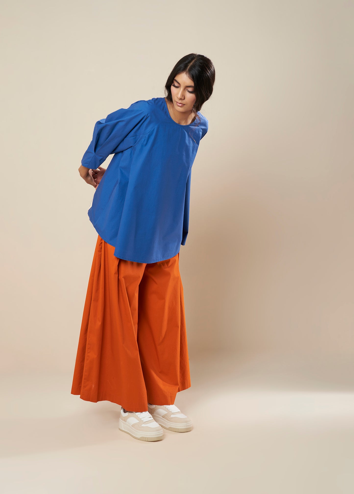 FLARE TOP WITH CONSTRUCTED SLEEVE