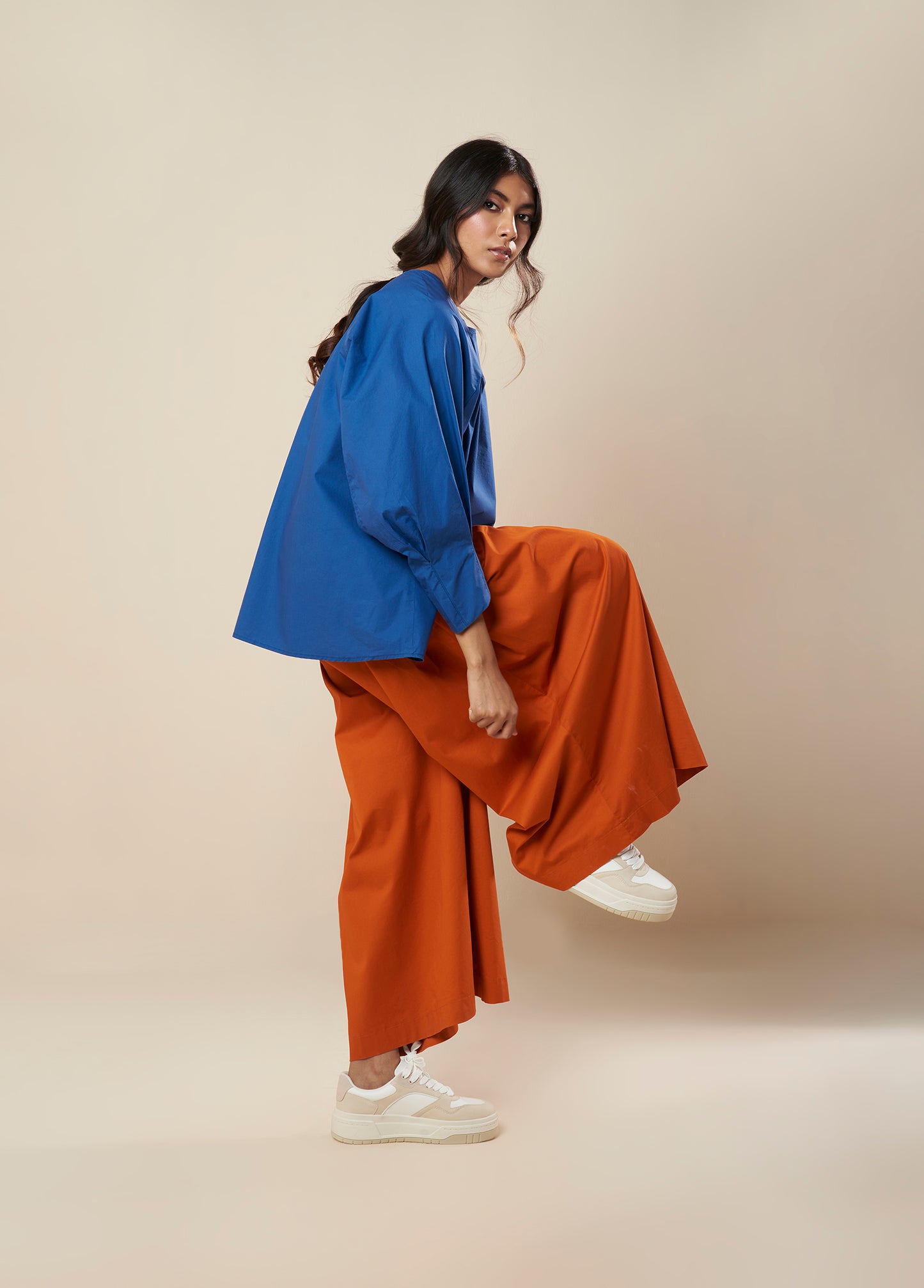 FLARED PANTS WITH SIDE PLEATS