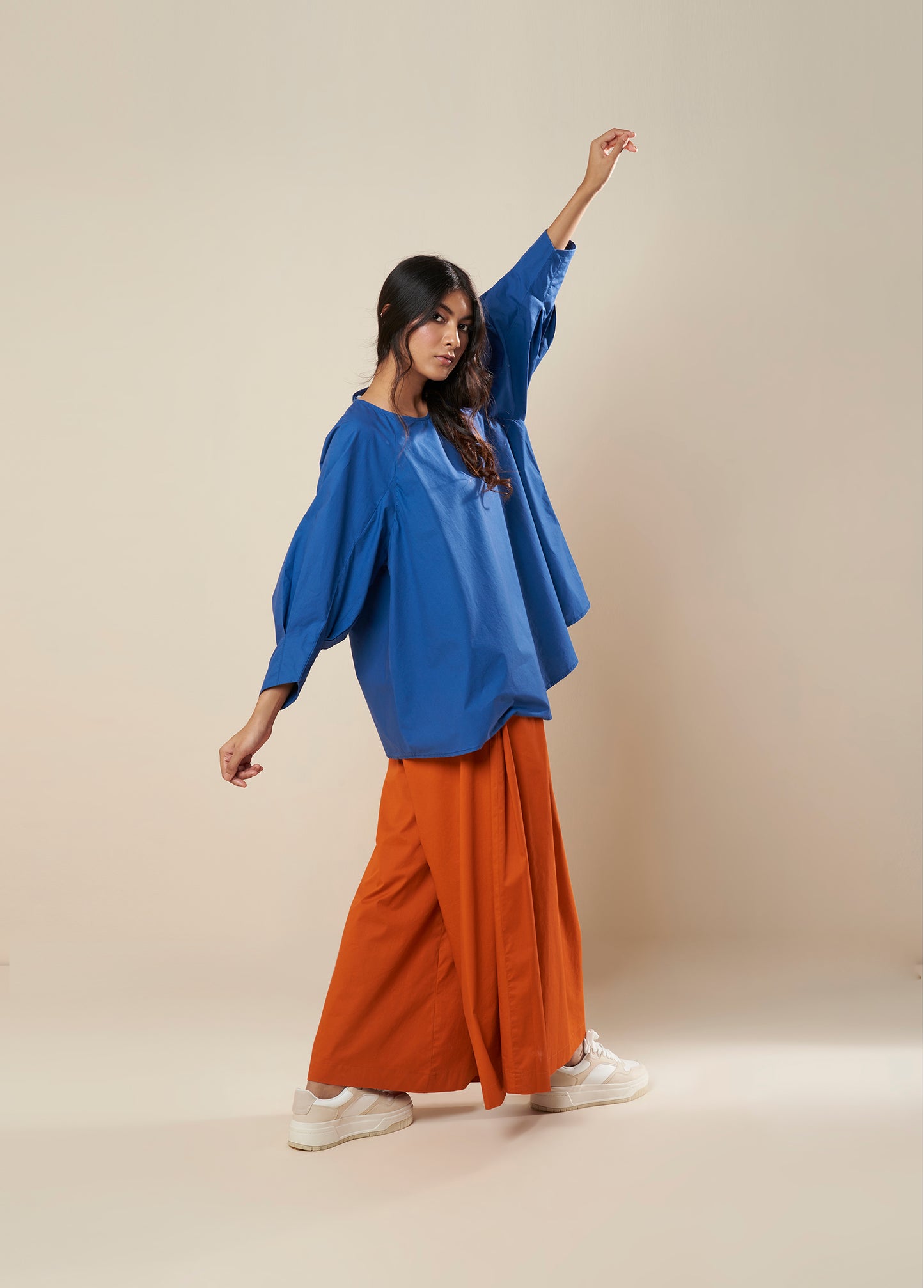 FLARE TOP WITH CONSTRUCTED SLEEVE