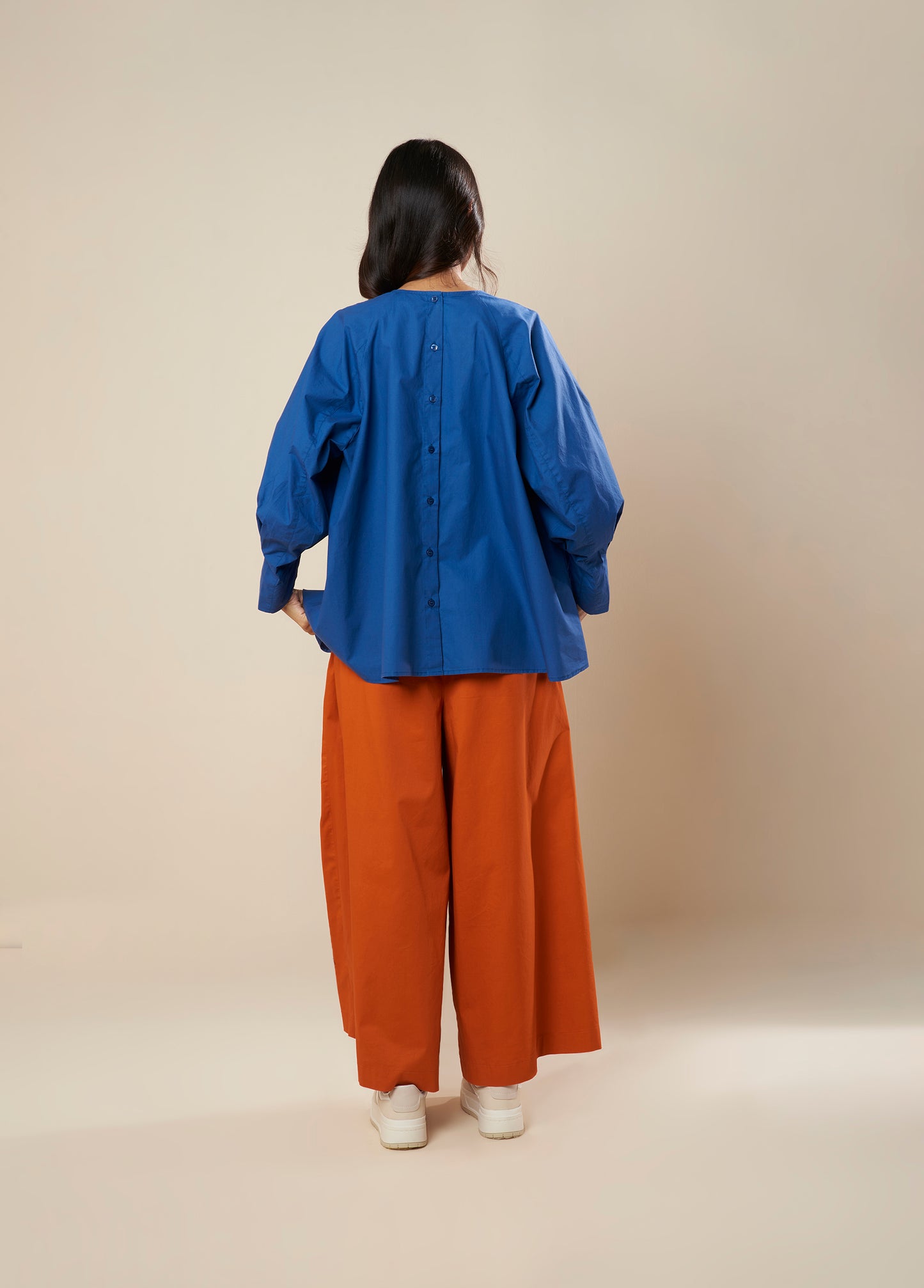 FLARE TOP WITH CONSTRUCTED SLEEVE