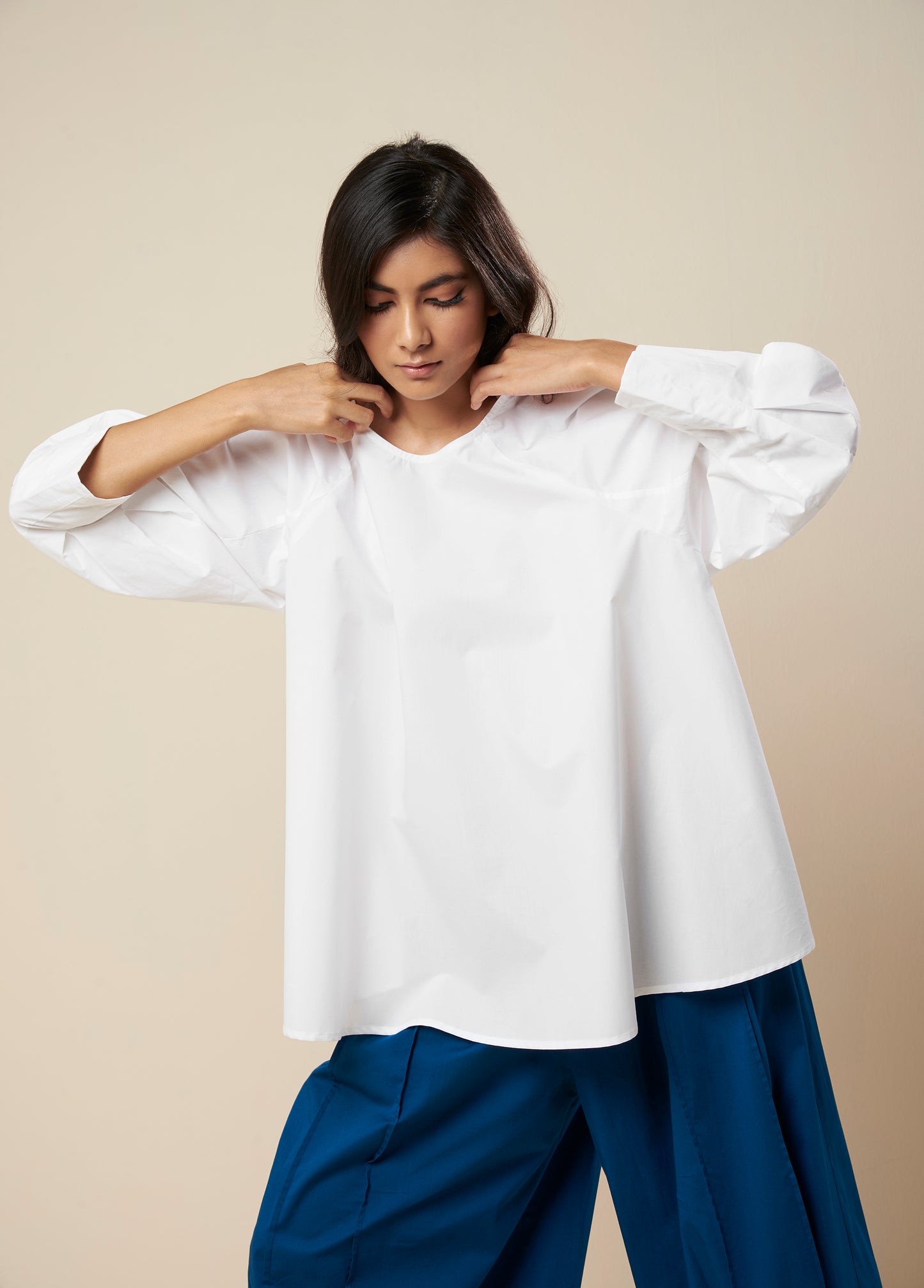 FLARE TOP WITH CONSTRUCTED SLEEVE