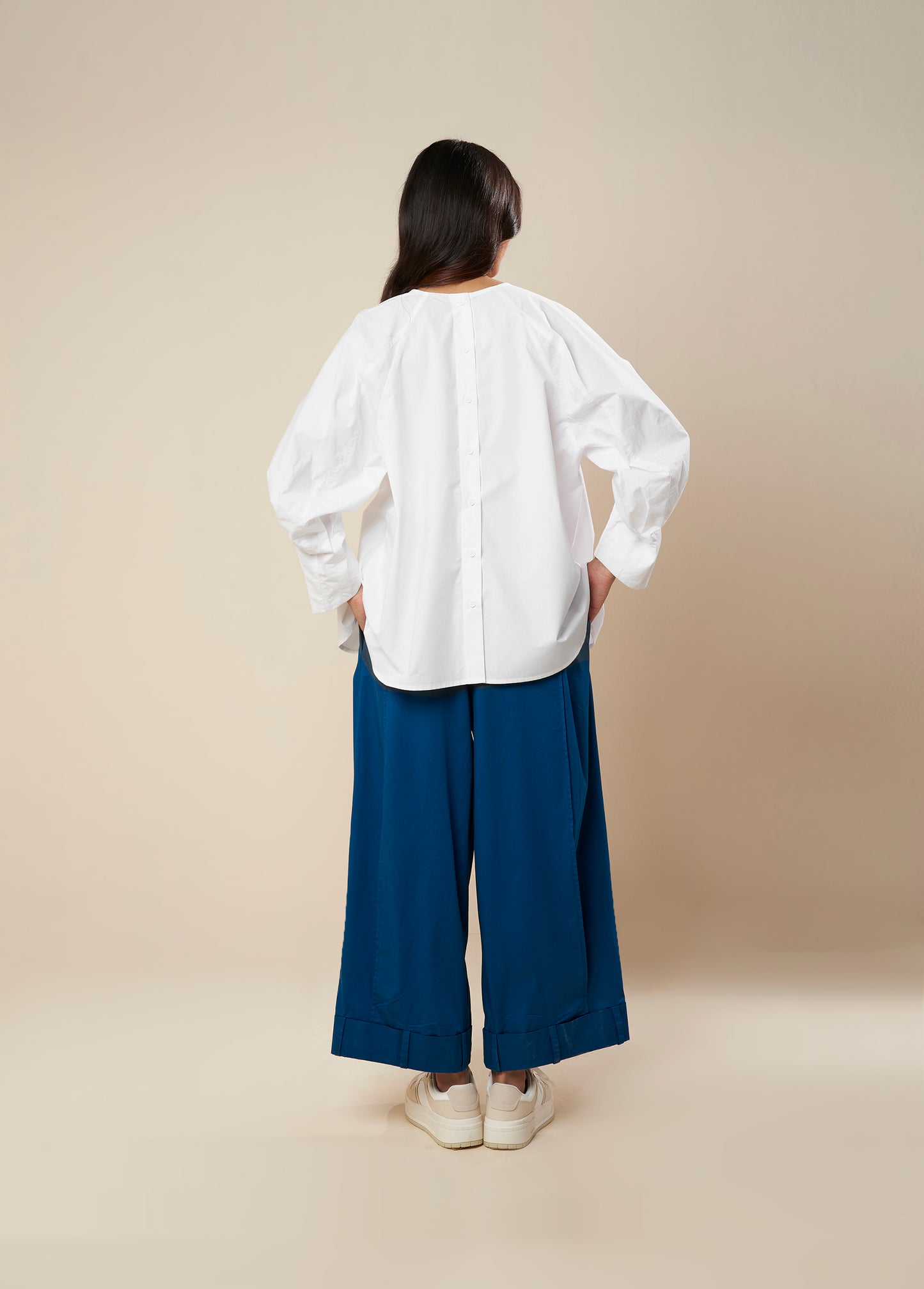 FLARE TOP WITH CONSTRUCTED SLEEVE