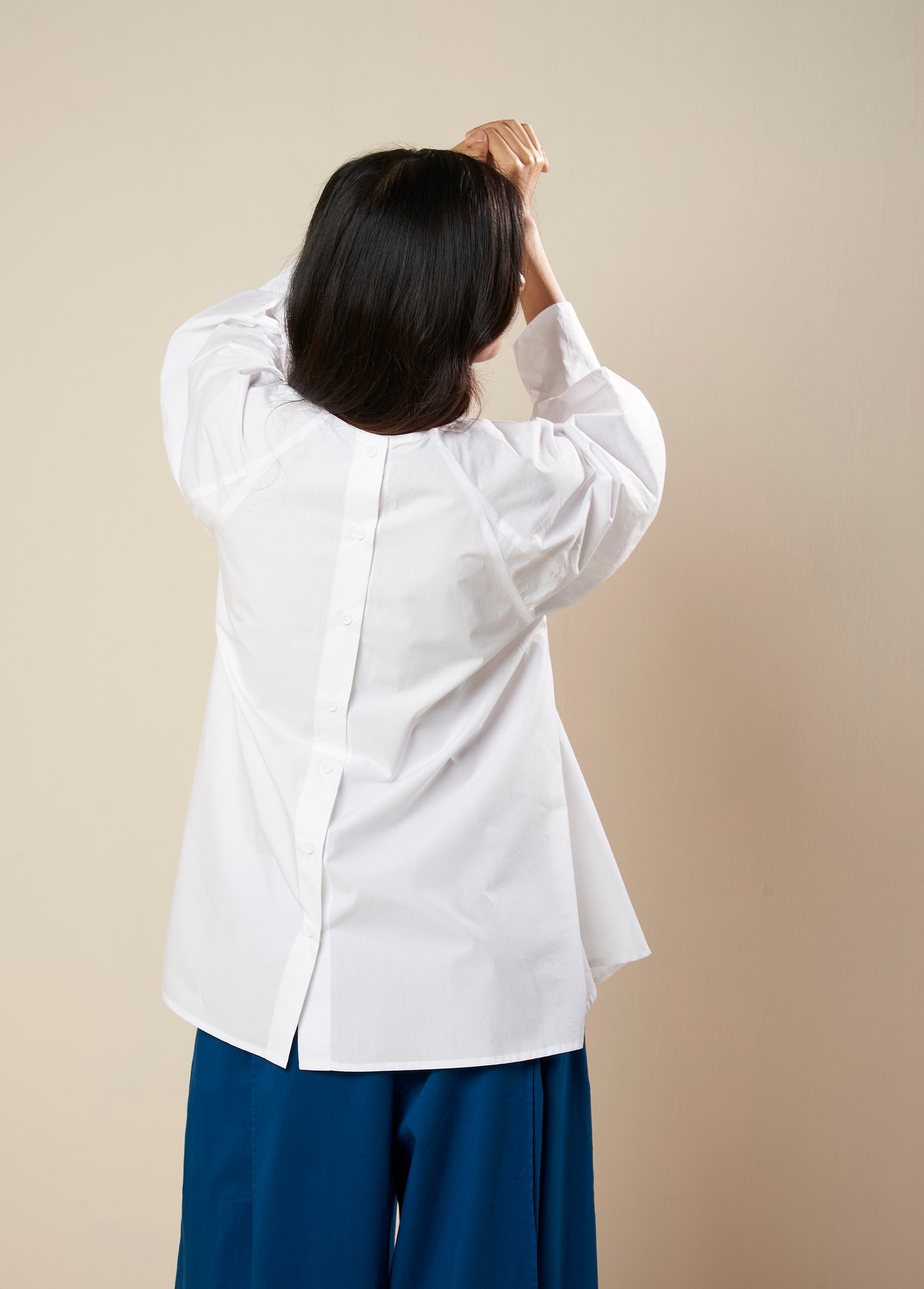 FLARE TOP WITH CONSTRUCTED SLEEVE