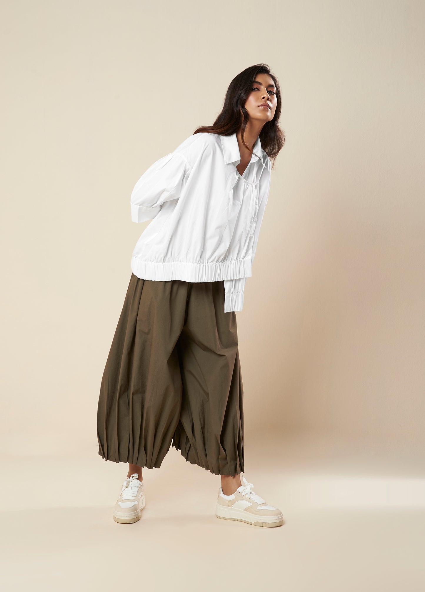 PANTS WITH PLEATED AND ELASTICATED HEM