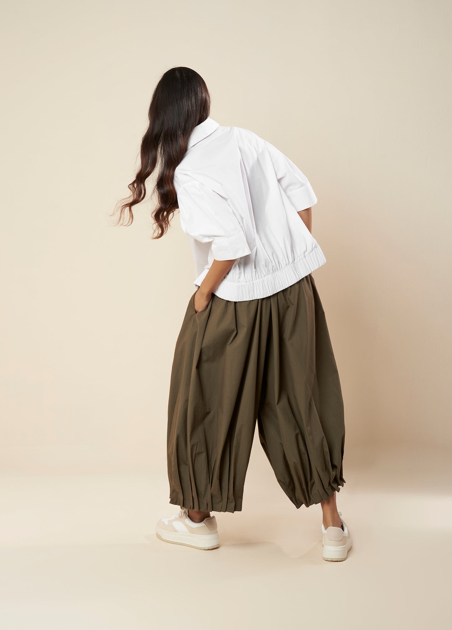 PANTS WITH PLEATED AND ELASTICATED HEM