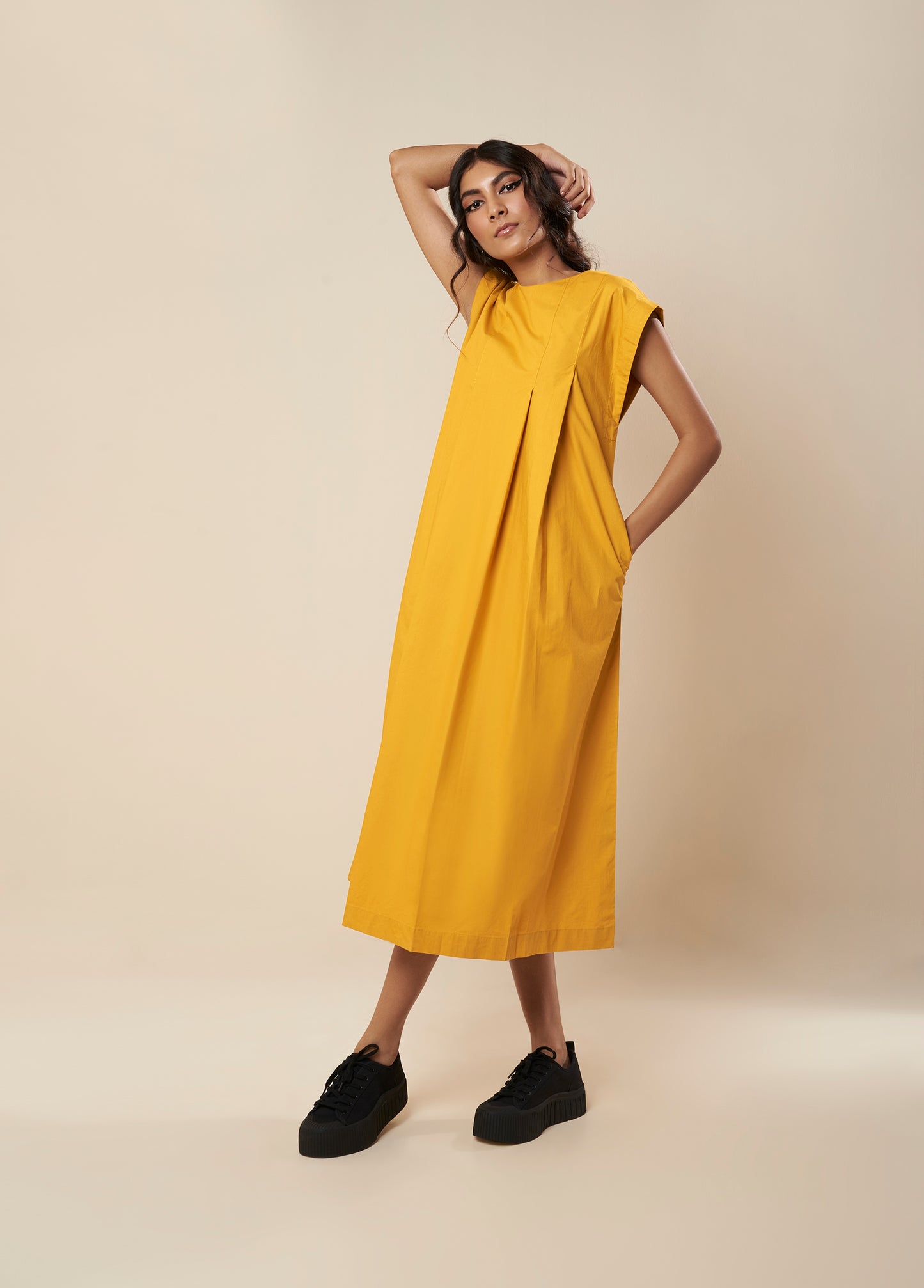 SLEEVELESSS PANEL DRESS WITH PLEATED FRONT
