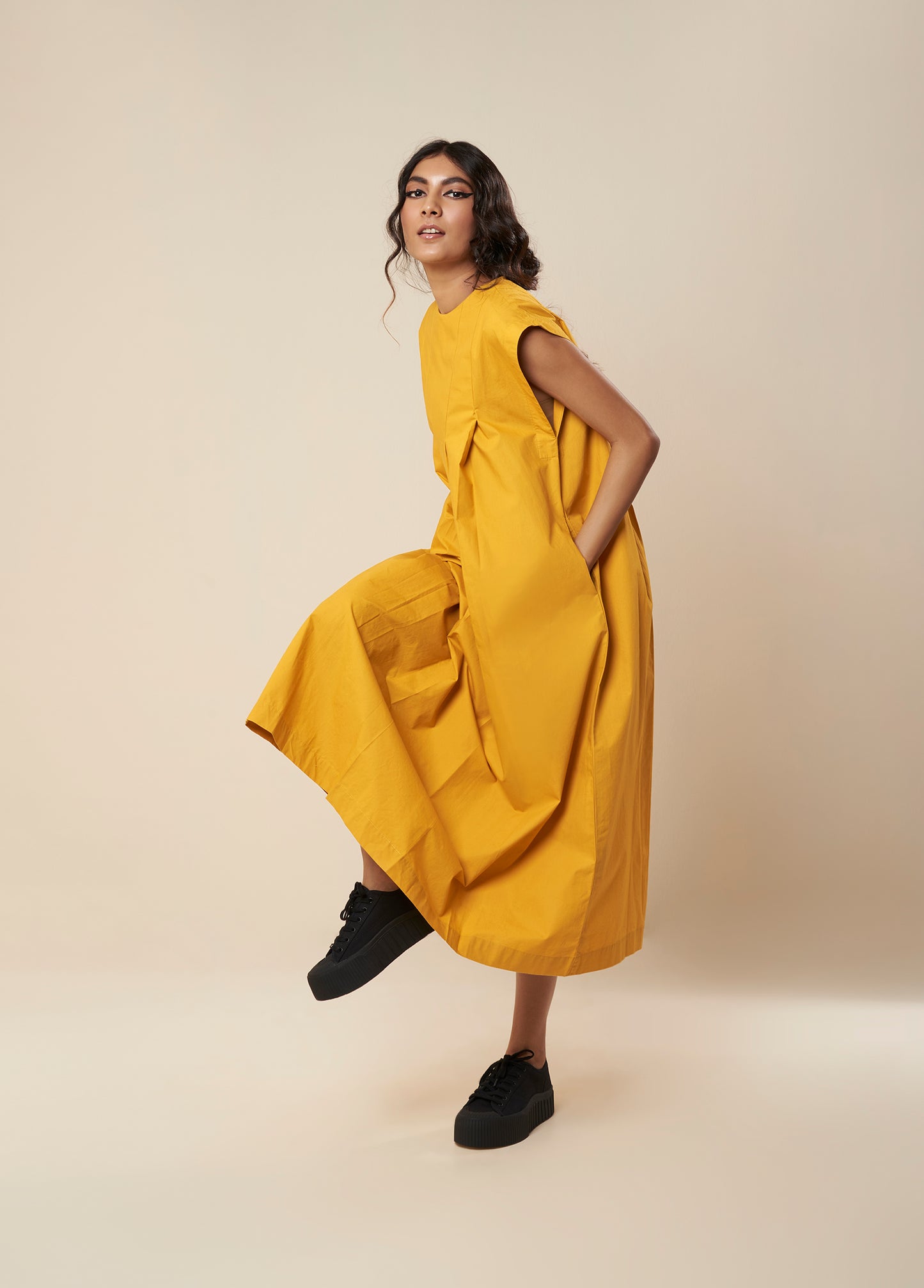 SLEEVELESSS PANEL DRESS WITH PLEATED FRONT