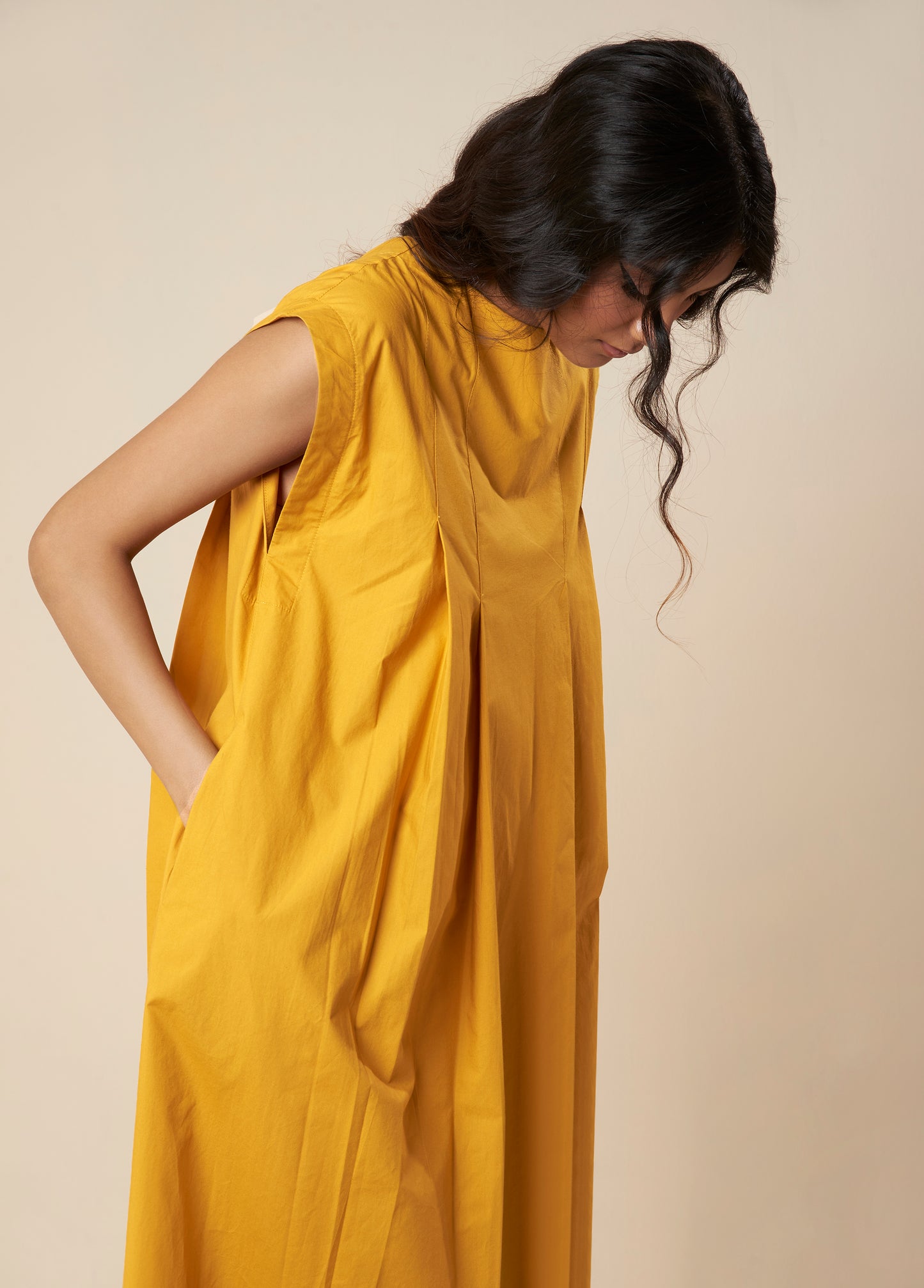 SLEEVELESSS PANEL DRESS WITH PLEATED FRONT