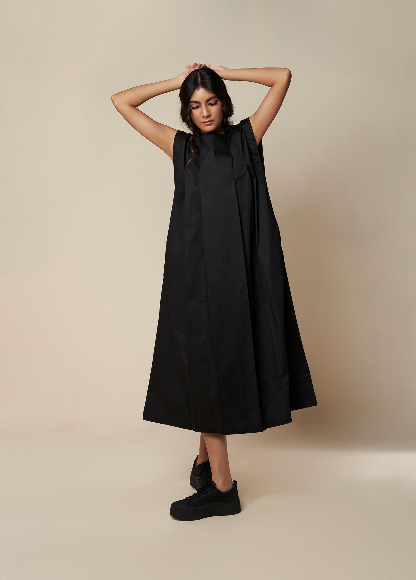 SLEEVELESSS PANEL DRESS WITH PLEATED FRONT