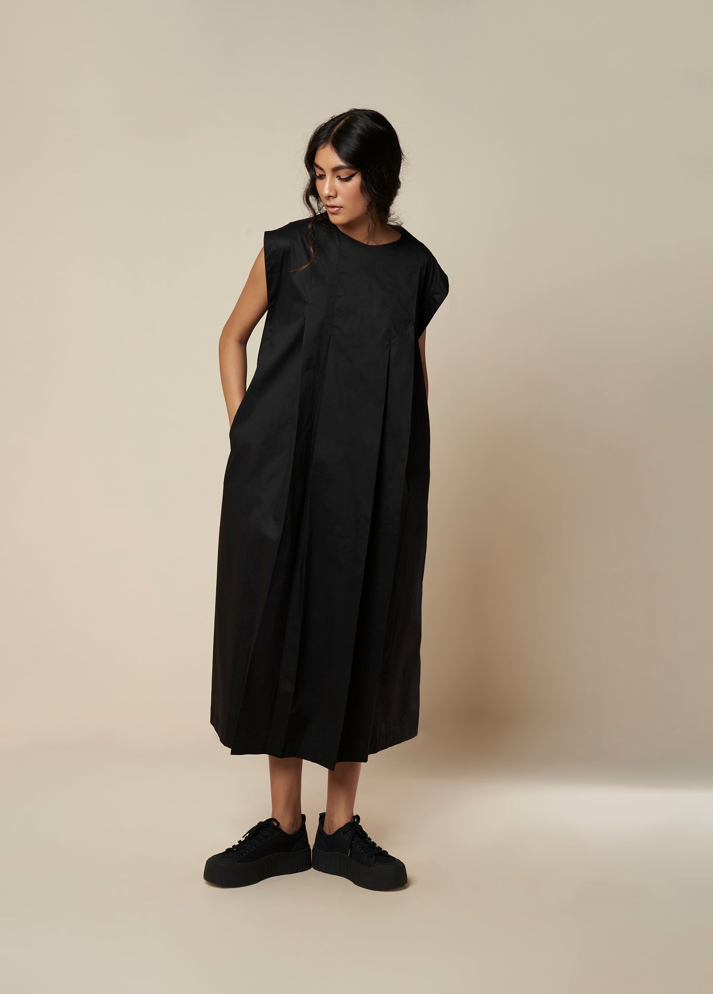 SLEEVELESSS PANEL DRESS WITH PLEATED FRONT