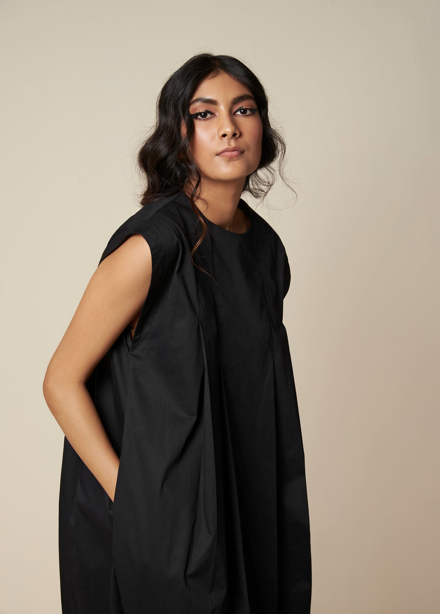 SLEEVELESSS PANEL DRESS WITH PLEATED FRONT