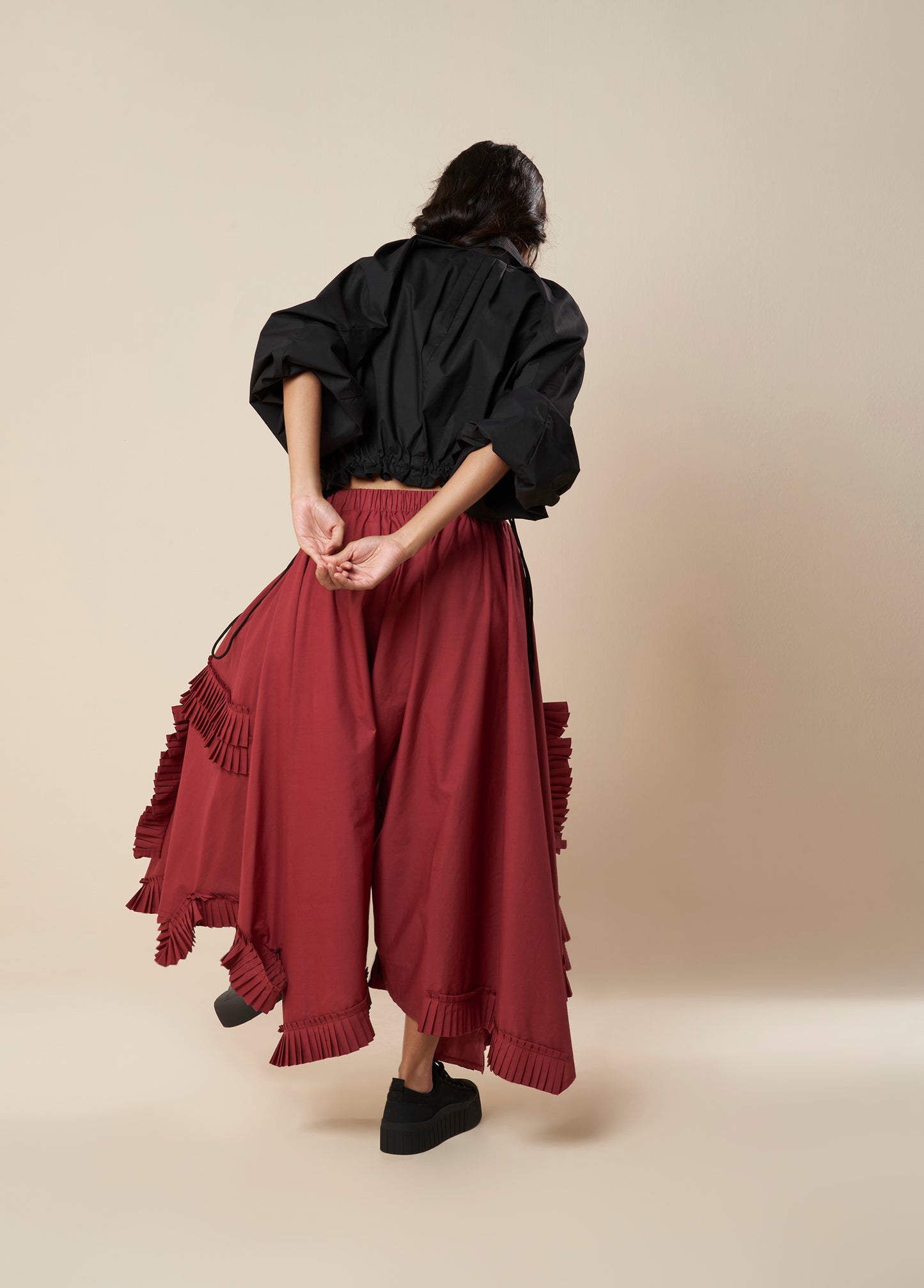 LOW CROTCH PANTS WITH ASYMMETRICAL FRILL PANELS