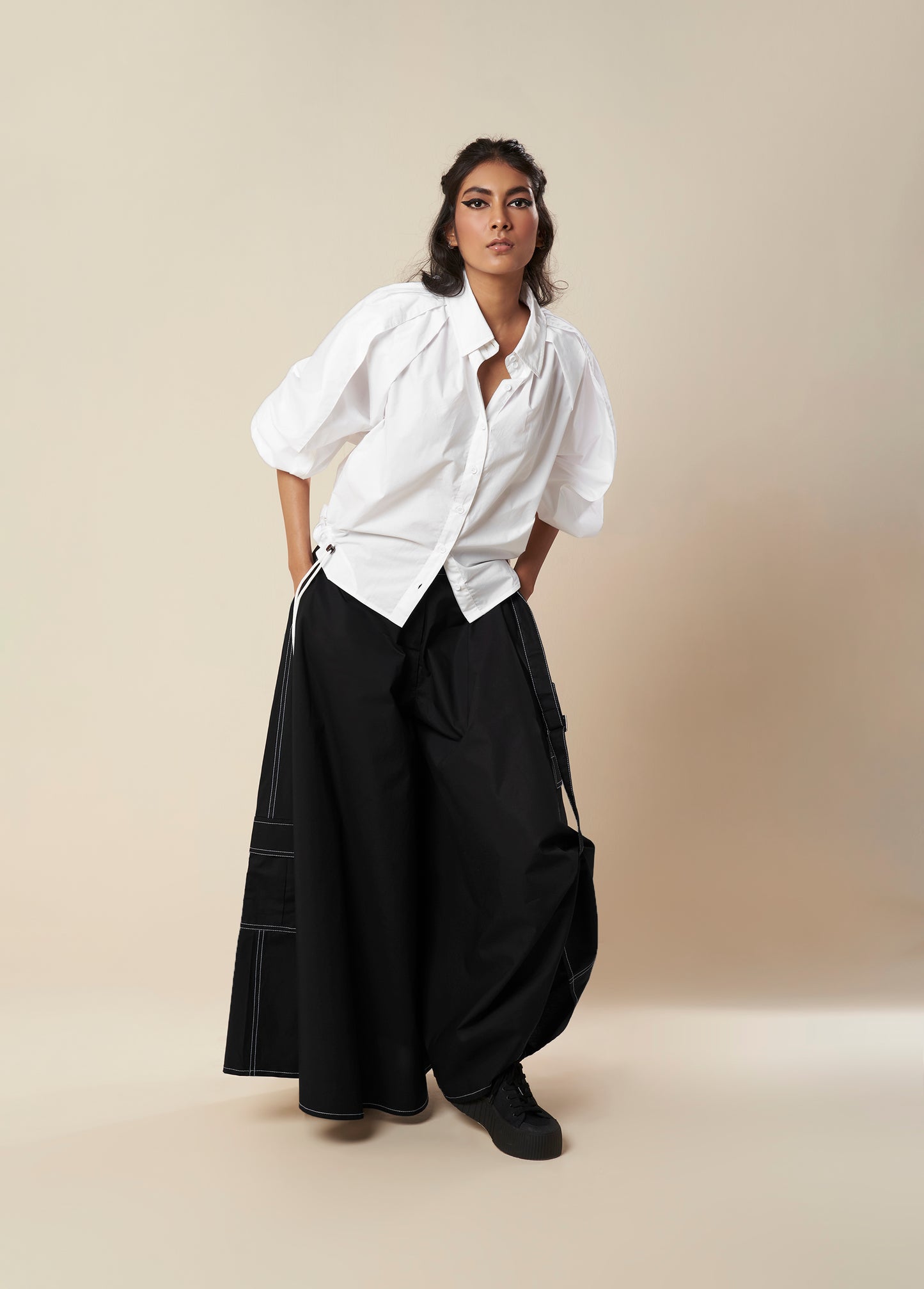 SHIRT WITH EXAGGERATED PLEATED SLEEVE AND ROUCHED HEM