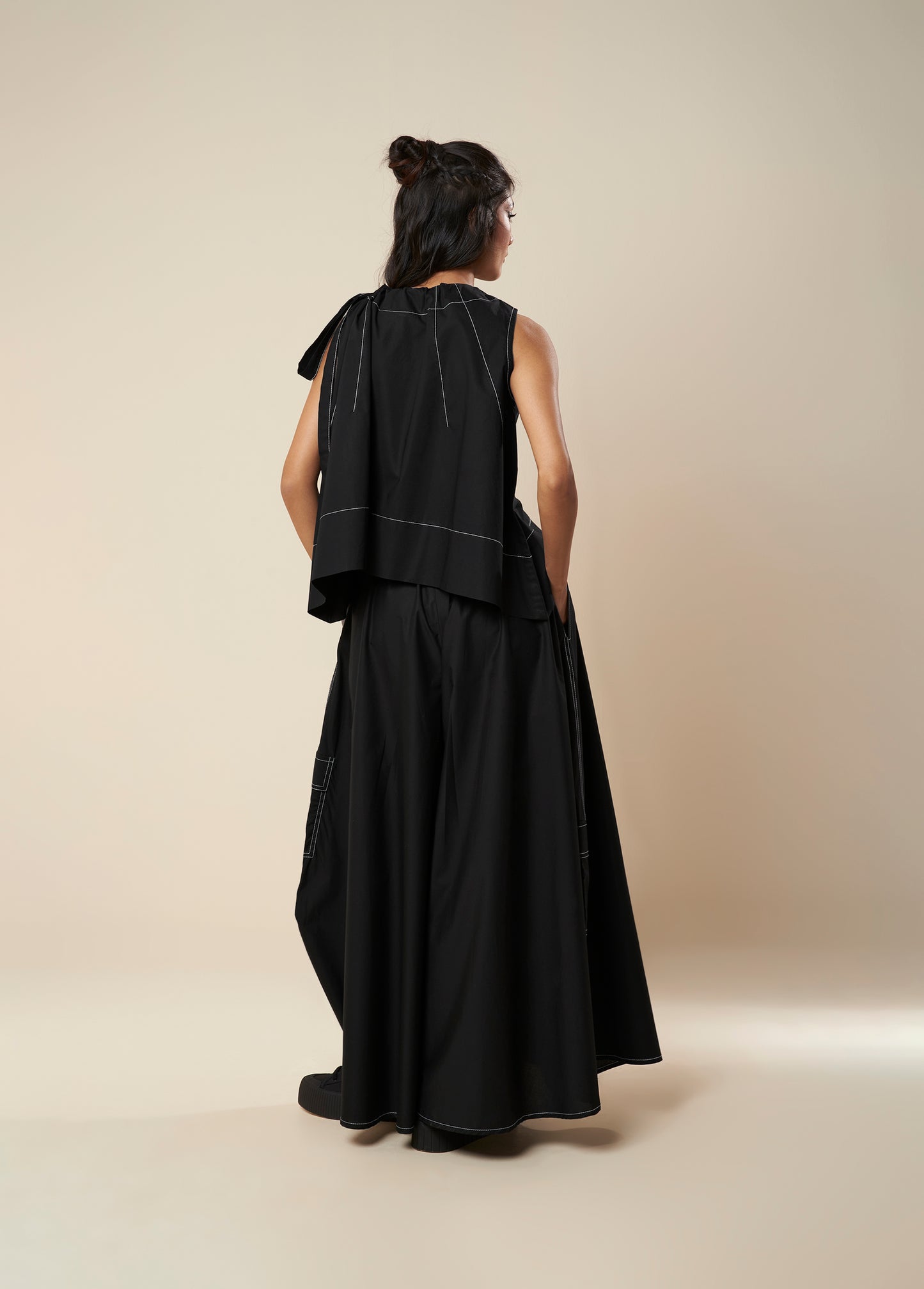 PANTS WITH CONTRAST STITCH AND STRAP DETAIL