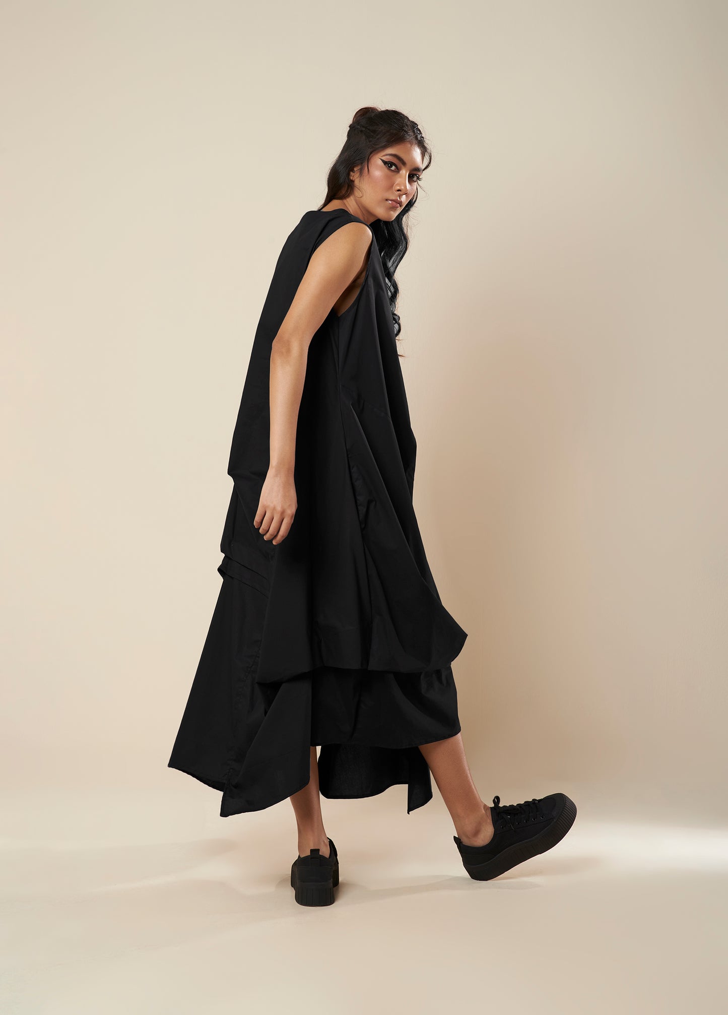 DRESS WITH DRAPE HEM AND STRAP DETAIL