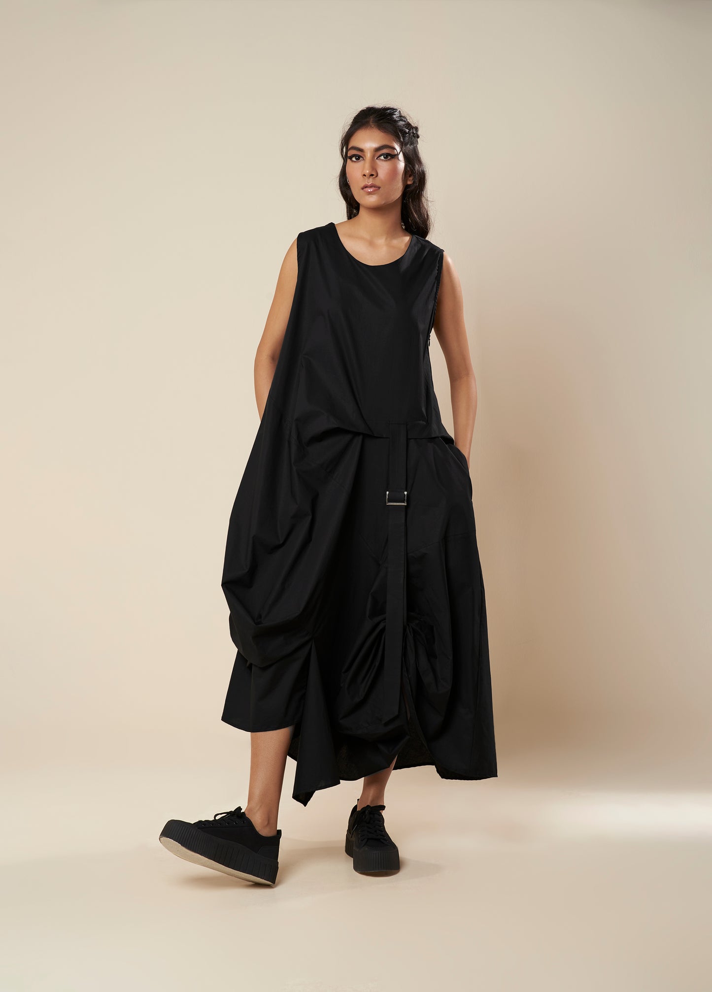 DRESS WITH DRAPE HEM AND STRAP DETAIL