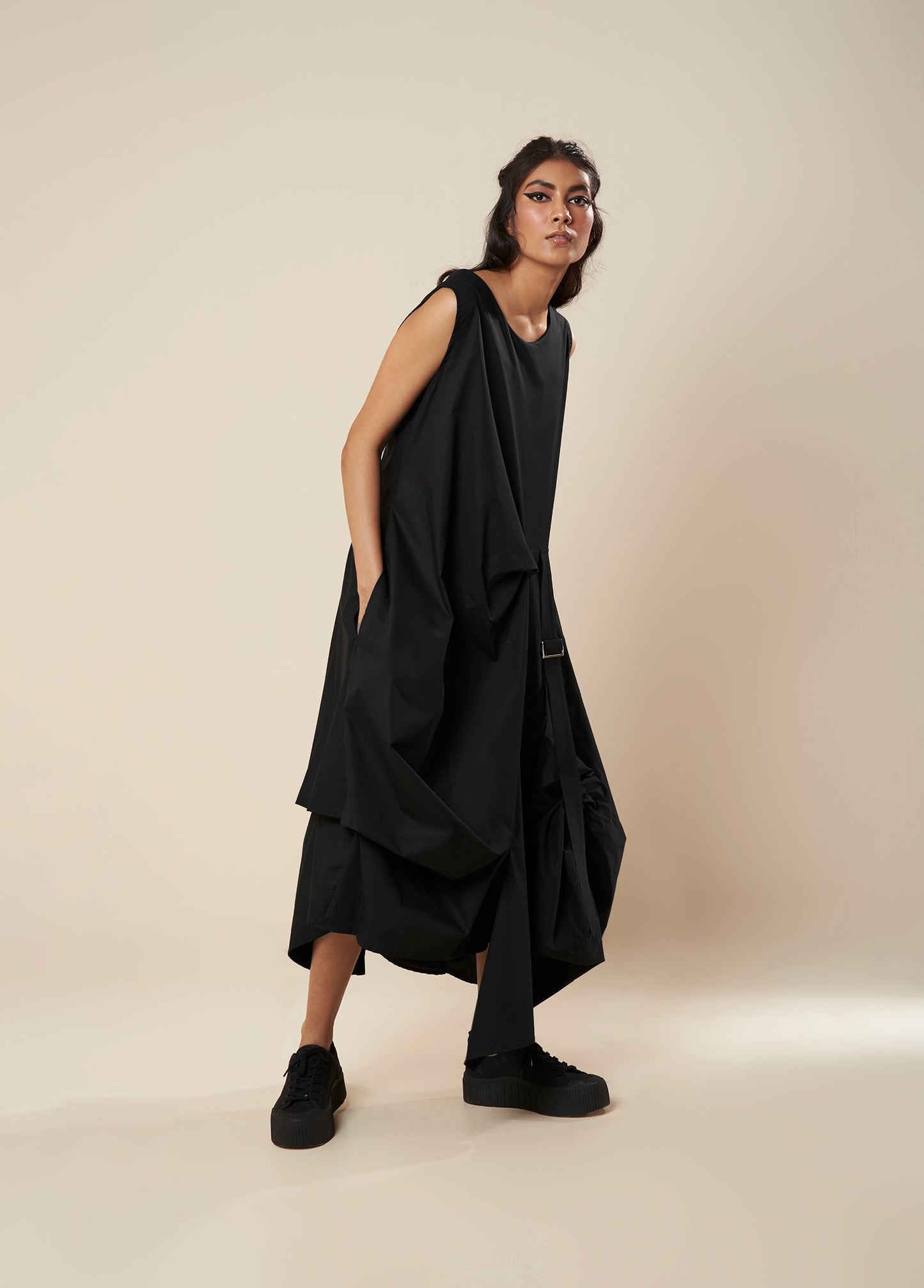 DRESS WITH DRAPE HEM AND STRAP DETAIL