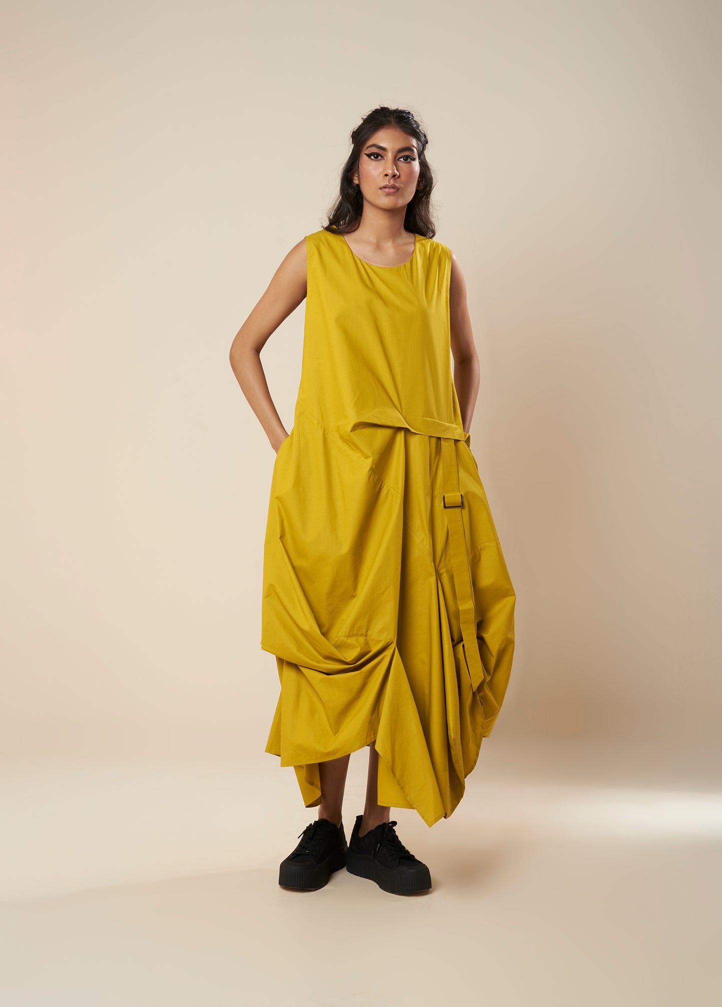 DRESS WITH DRAPE HEM AND STRAP DETAIL