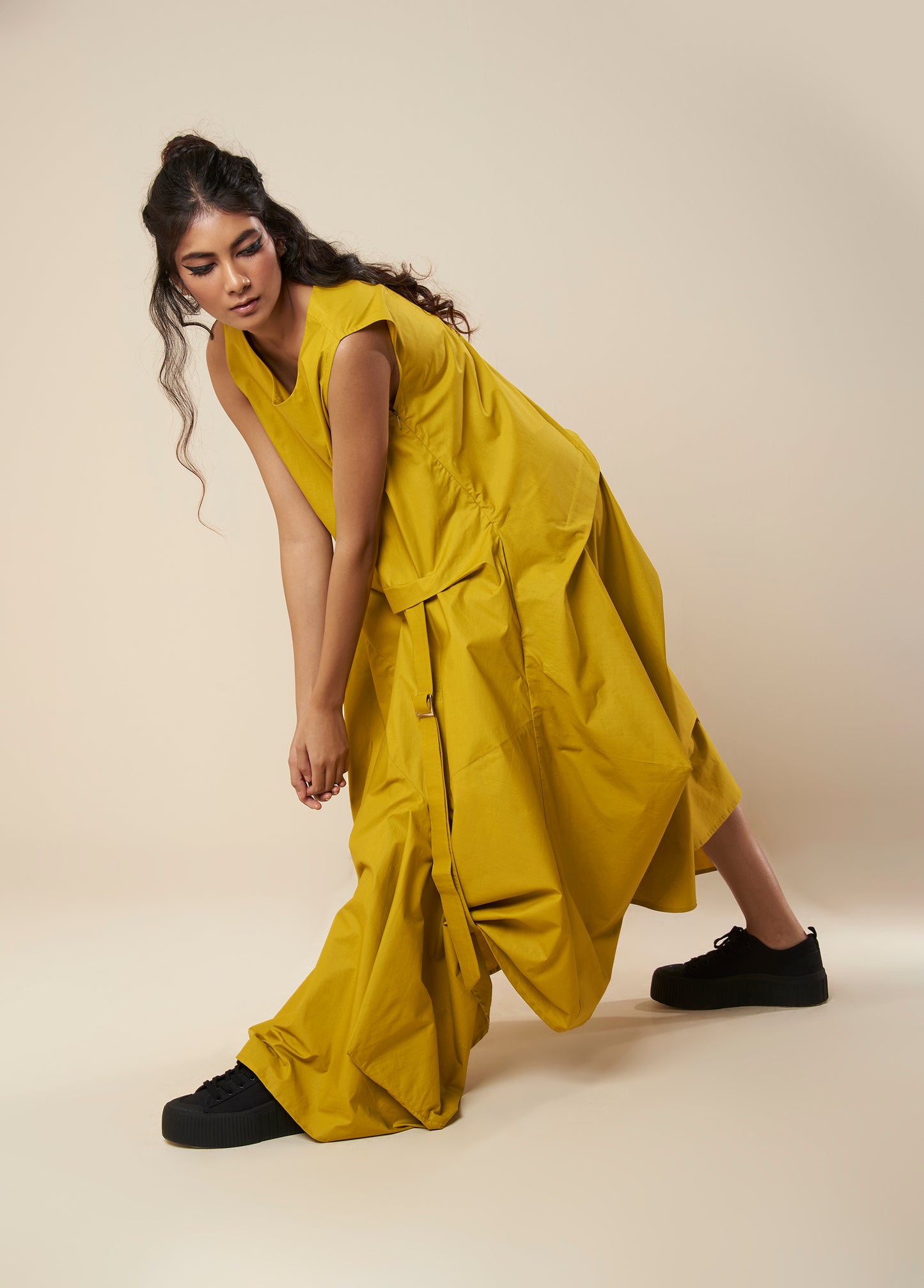 DRESS WITH DRAPE HEM AND STRAP DETAIL