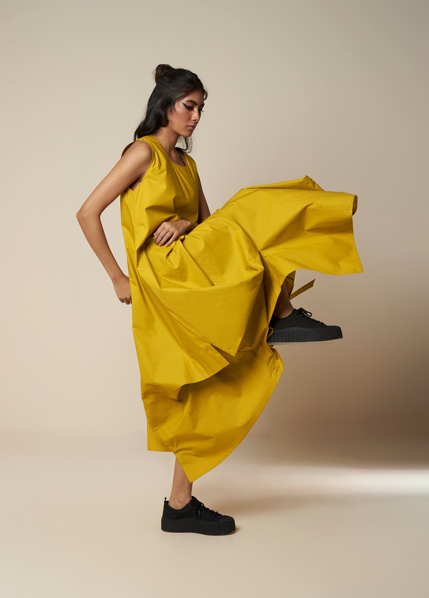 DRESS WITH DRAPE HEM AND STRAP DETAIL