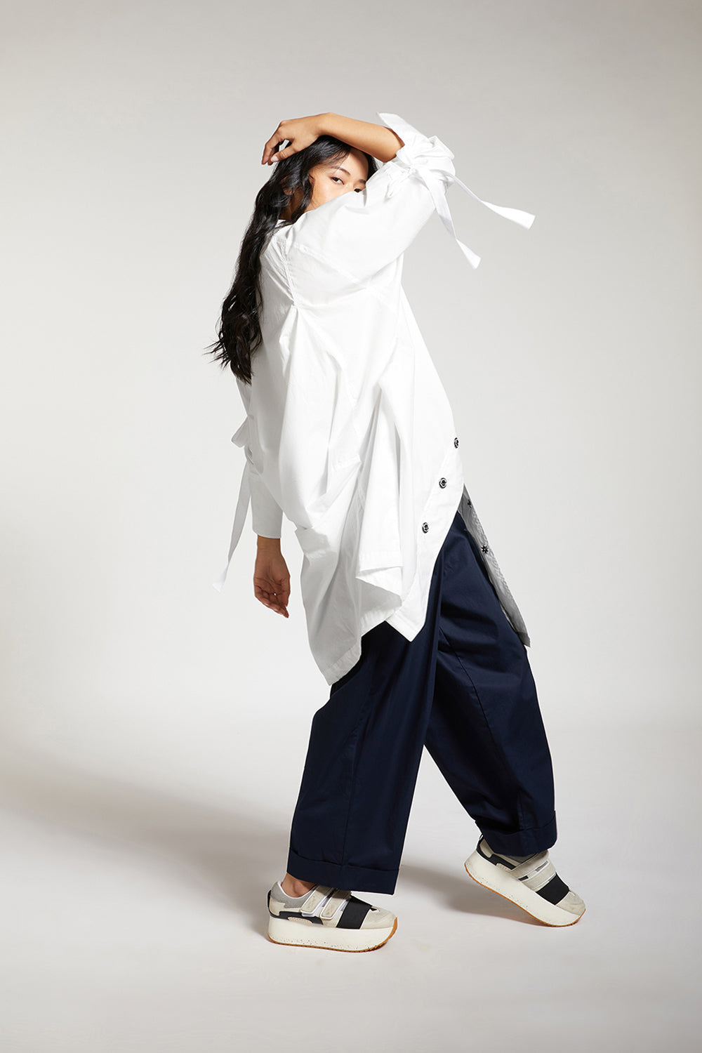 SHIRT WITH DRAPED BACK AND METAL BUTTONS