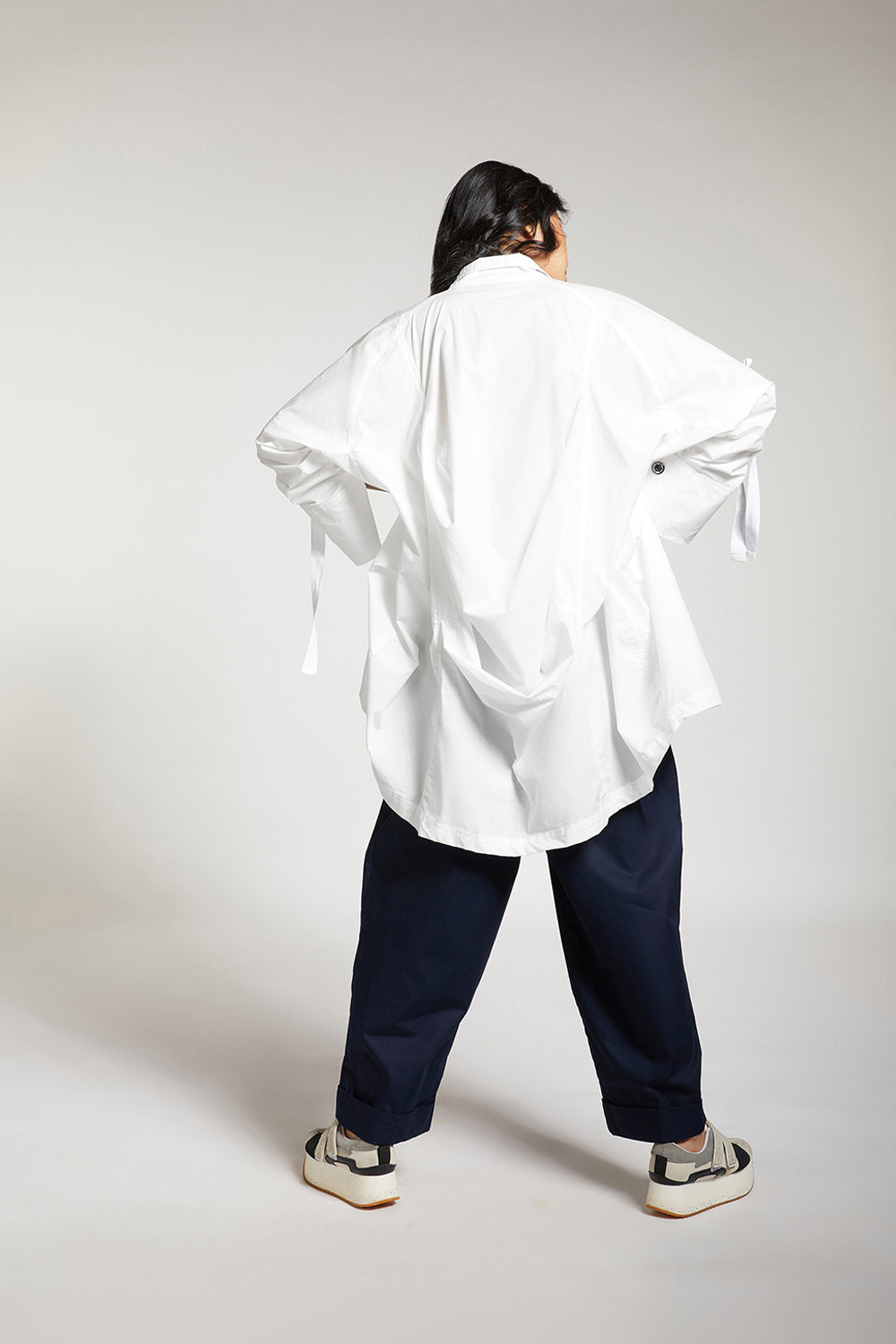 SHIRT WITH DRAPED BACK AND METAL BUTTONS