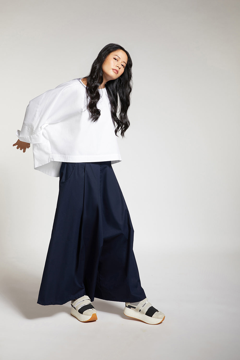 LOW CROTCH FLARE PANTS WITH PLEATS