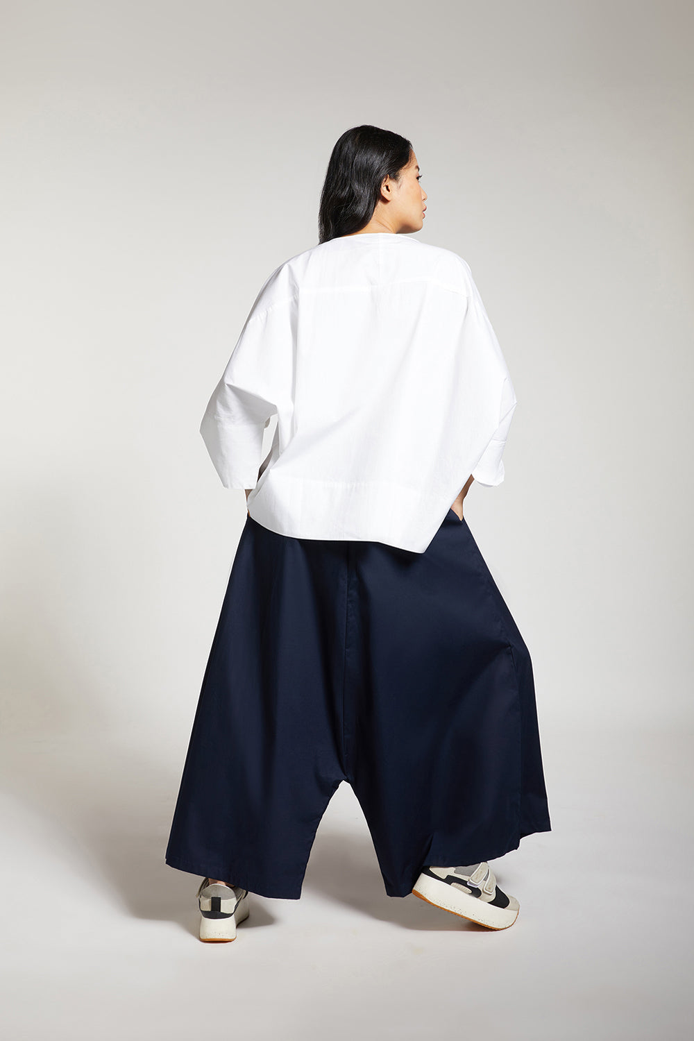 LOW CROTCH FLARE PANTS WITH PLEATS
