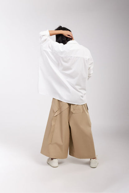 SHIRT WITH ONE SIDED BACK PLEAT
