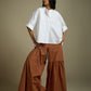 HIGH-LO TOP WITH FLARE AND PLEATED SLEEVE