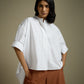 HIGH-LO TOP WITH FLARE AND PLEATED SLEEVE