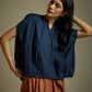 HIGH-LO TOP WITH FRONT AND BACK PLEATS