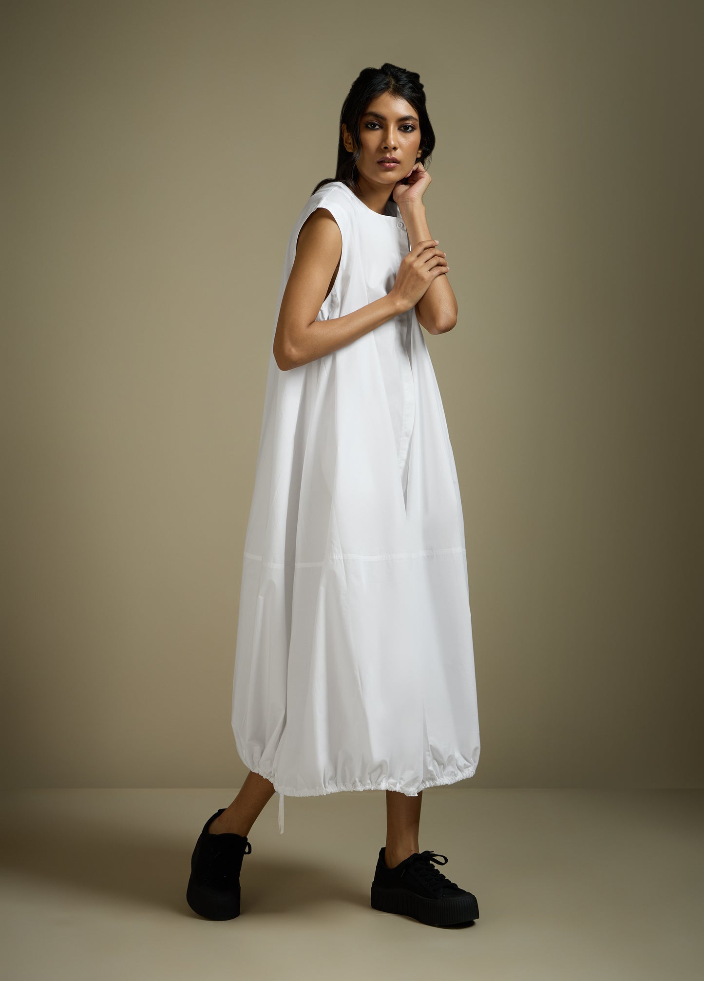 DRESS WITH HEM ROUCHE AND PANEL DETAIL