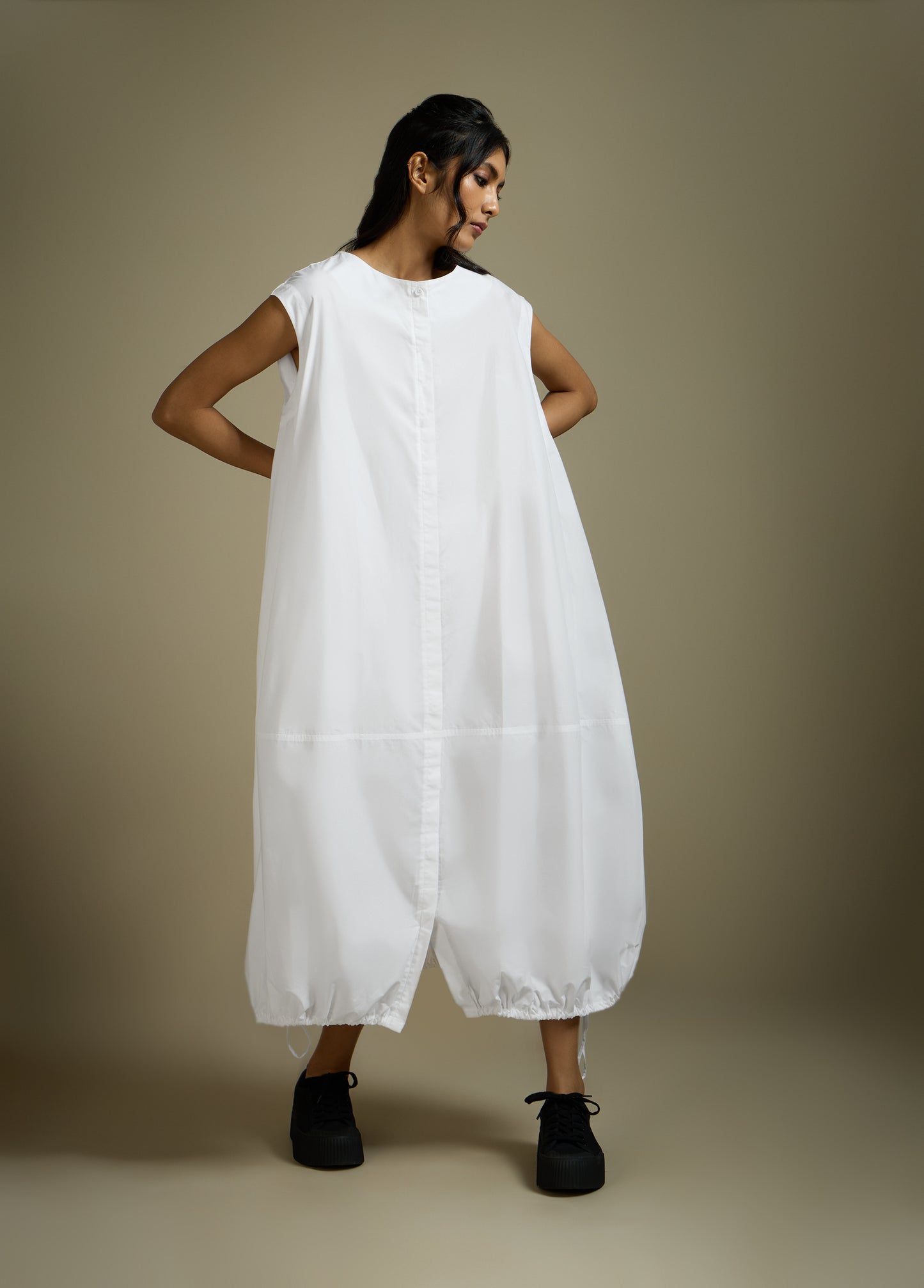 DRESS WITH HEM ROUCHE AND PANEL DETAIL