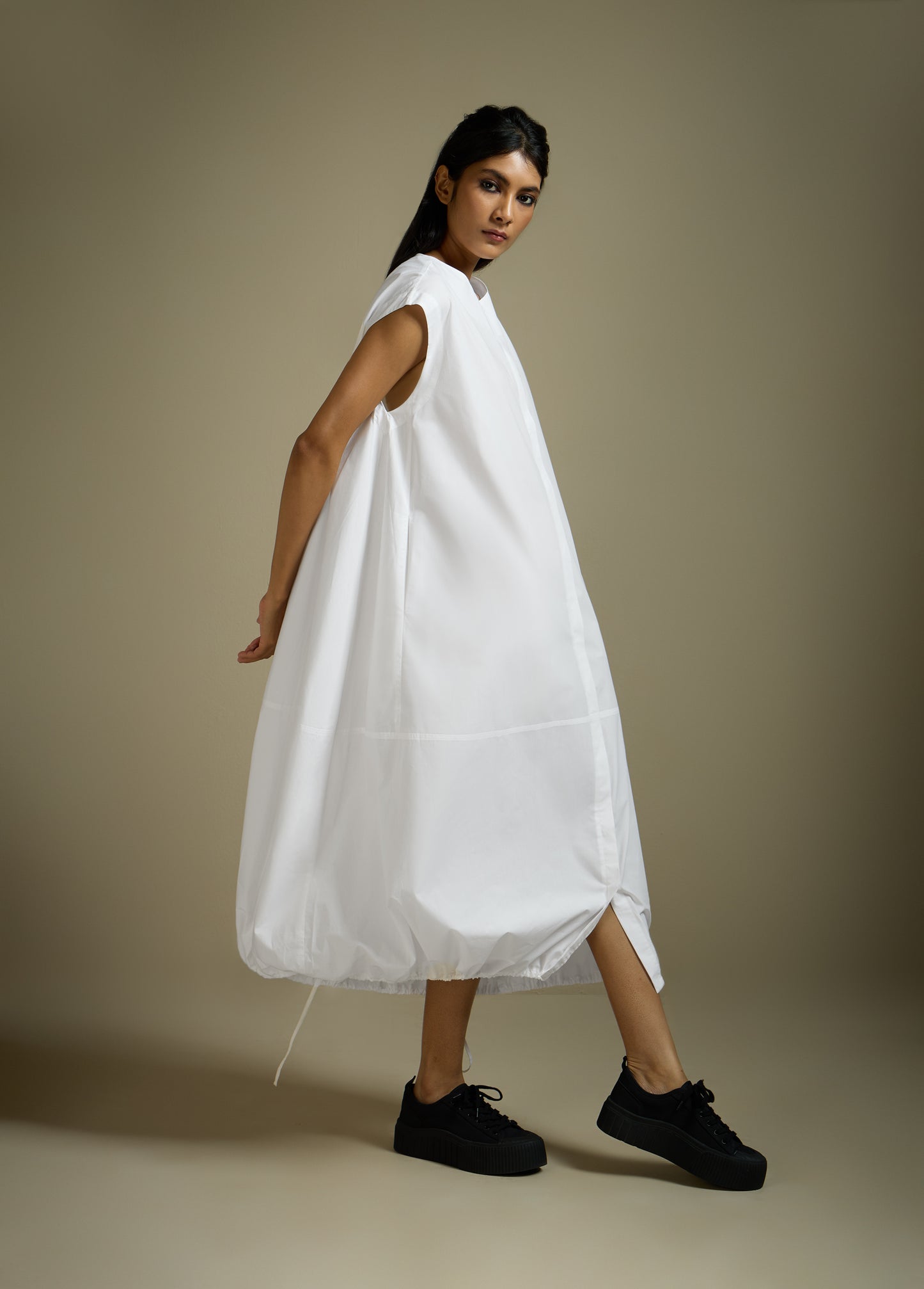 DRESS WITH HEM ROUCHE AND PANEL DETAIL