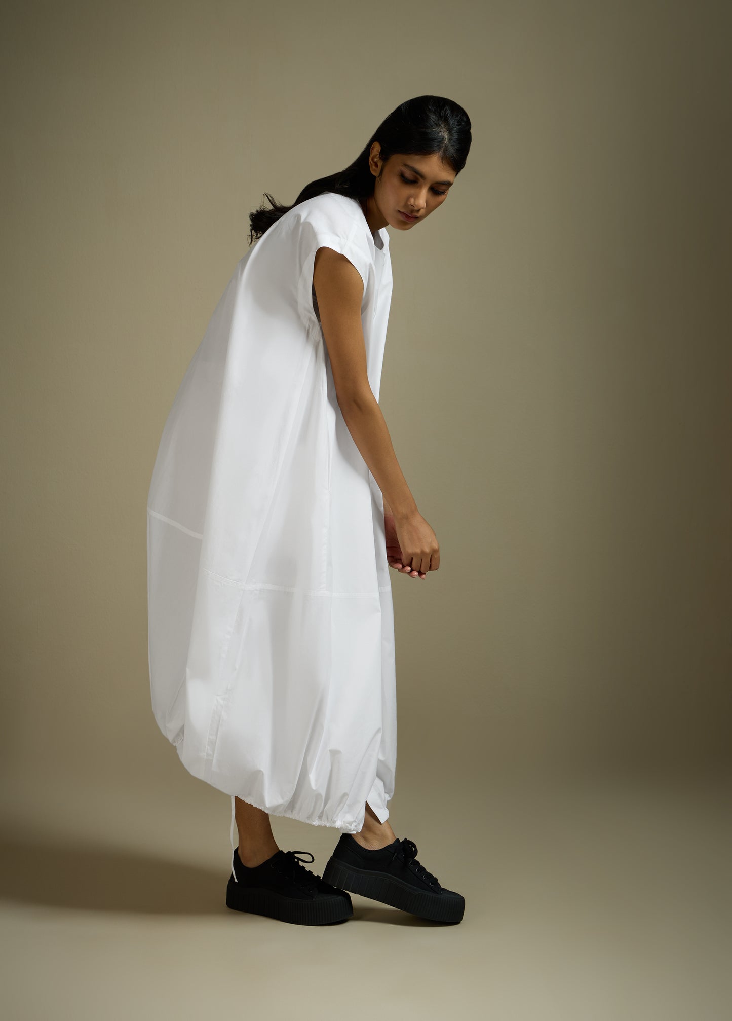 DRESS WITH HEM ROUCHE AND PANEL DETAIL