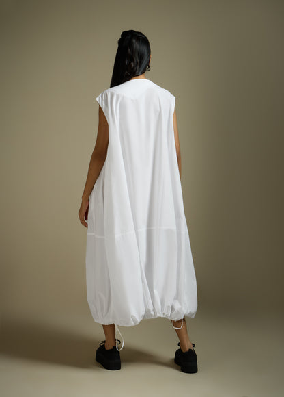 DRESS WITH HEM ROUCHE AND PANEL DETAIL