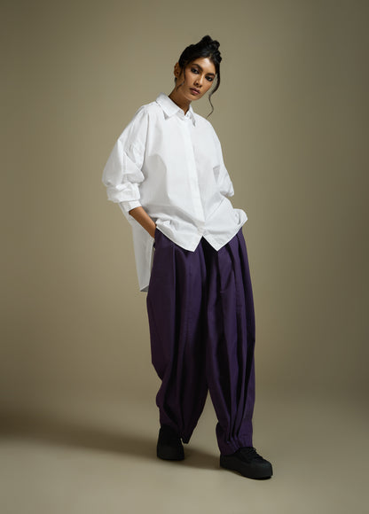 PLEATED PANTS WITH TAPERED HEM