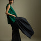 SLEEVELESS TOP WITH HEM DRAPE