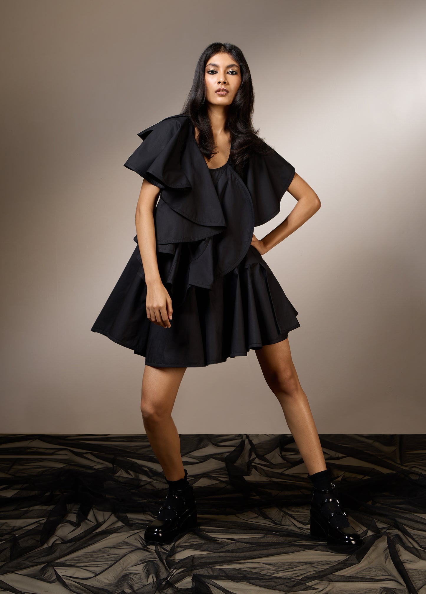 FLARE DRESS WITH RUFFLE PANELS AND BELTED WAIST