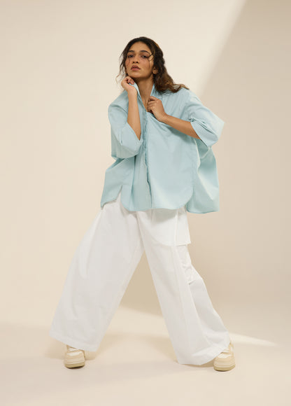 SHIRT WITH DECONSTRUCTED SLEEVES AND FLARE HEM