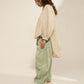 HIGH LOW TOP WITH FRONT PLEATS, CONSTRUCTED SLEEVE  AND HEM ELASTIC
