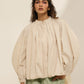 HIGH LOW TOP WITH FRONT PLEATS, CONSTRUCTED SLEEVE  AND HEM ELASTIC
