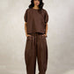 PANTS WITH SIDE PLEAT PANEL